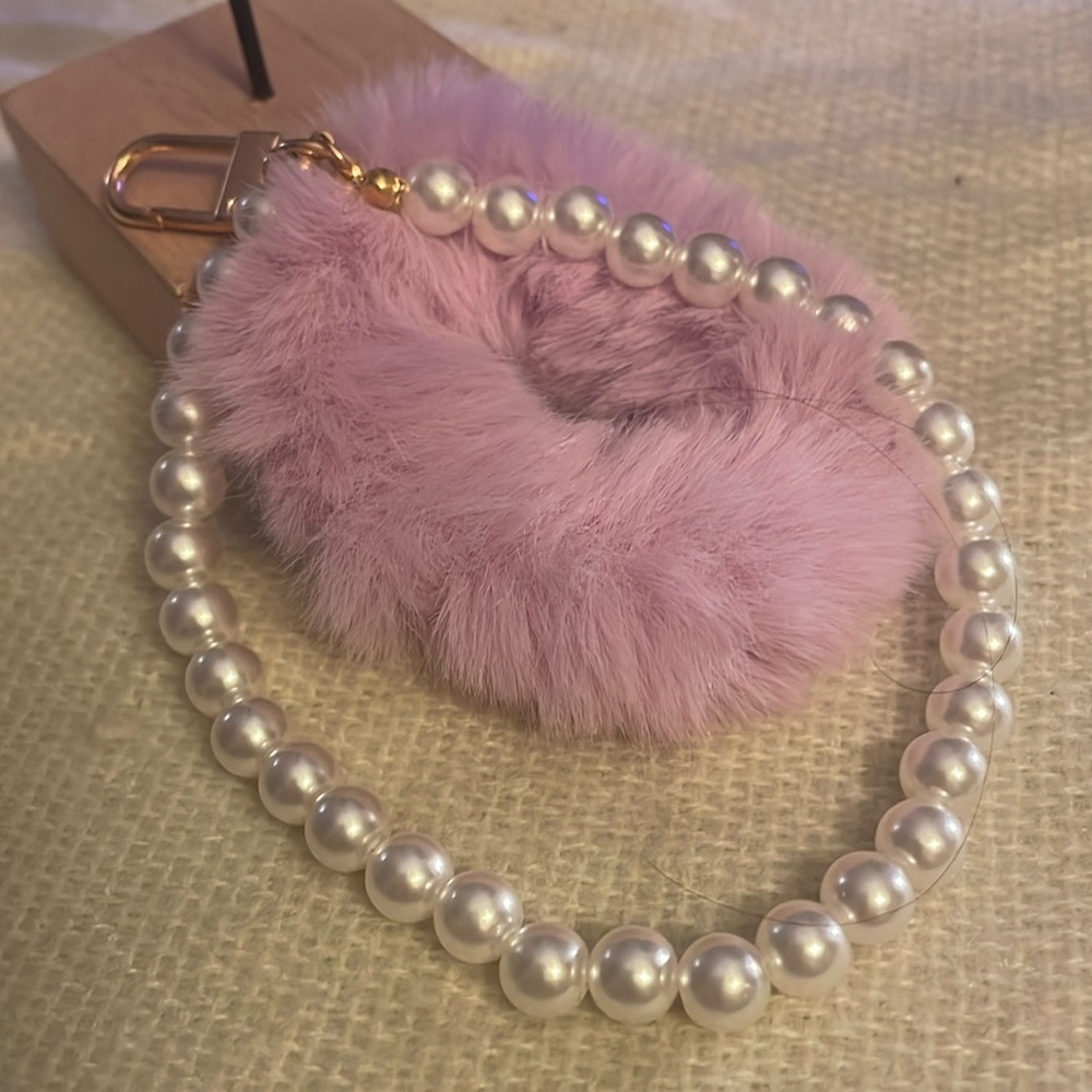 Key ring with faux pearl and fuzzy wrist straps